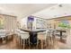 Entertaining space with a full bar with seating, and a billiards table under a decorative light fixture at 2793 Red Arrow Dr, Las Vegas, NV 89135