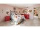 Inviting bedroom featuring neutral floors and pink walls at 2857 San Lago Ct, Las Vegas, NV 89121