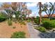 Well-maintained landscaping and walking path at 2857 San Lago Ct, Las Vegas, NV 89121