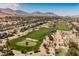 Beautiful aerial view of the golf course and neighborhood at 3042 Soft Horizon Way, Las Vegas, NV 89135