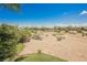 Scenic view of lush backyard and golf course, perfect for relaxation at 3042 Soft Horizon Way, Las Vegas, NV 89135