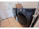 Updated laundry room featuring a modern washer and dryer at 3042 Soft Horizon Way, Las Vegas, NV 89135