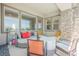 Comfortable covered patio with stylish seating, offering a relaxing outdoor living space at 3042 Soft Horizon Way, Las Vegas, NV 89135