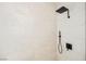 Close-up of a modern glass shower with sleek black fixtures and tiled walls at 3042 Soft Horizon Way, Las Vegas, NV 89135
