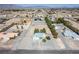 Expansive desert property featuring a single-story home, desert landscaping, and neighborhood views at 3580 S Shawnee Ave, Pahrump, NV 89048