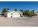 Charming single-story home with a three-car garage and desert landscaping for low maintenance at 3580 S Shawnee Ave, Pahrump, NV 89048