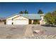 Charming single-story home with a three-car garage and low maintenance desert landscaping at 3580 S Shawnee Ave, Pahrump, NV 89048
