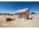 Detached outbuilding with tile roof, suitable for workshop or storage at 3580 S Shawnee Ave, Pahrump, NV 89048