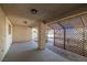 Covered patio featuring lattice details and sturdy concrete flooring at 3580 S Shawnee Ave, Pahrump, NV 89048