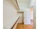Walk-in closet with built-in shelving and wood floors at 3640 Snowy Pines St, Las Vegas, NV 89147