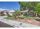 Charming home featuring a well-manicured lawn, lush landscaping, and inviting curb appeal in a desirable neighborhood at 3640 Snowy Pines St, Las Vegas, NV 89147