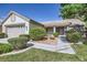 Inviting home with lush greenery, well-maintained landscaping, and a welcoming entrance, enhancing curb appeal at 3640 Snowy Pines St, Las Vegas, NV 89147