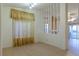 Spacious living room with tile flooring and fireplace at 390 Montego Ln, Boulder City, NV 89005