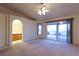 Living room with access to bathroom and outdoor patio at 390 Montego Ln, Boulder City, NV 89005