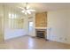 The living room has tile flooring and a fireplace at 390 Montego Ln, Boulder City, NV 89005