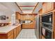 Bright kitchen with stainless steel appliances and white countertops at 3987 Saddlewood Ct, Las Vegas, NV 89121
