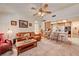 Open living area with seamless flow to the kitchen and lots of natural light at 3987 Saddlewood Ct, Las Vegas, NV 89121