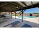 Community pool area with shaded lounge seating, a pool, and hot tub for relaxation at 3987 Saddlewood Ct, Las Vegas, NV 89121