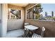 Cozy patio with a bistro table and chairs, perfect for enjoying the outdoors at 4200 S Valley View Blvd # 1077, Las Vegas, NV 89103
