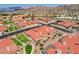 Wide aerial view highlighting the community's layout with meticulously landscaped yards and walkways at 445 Intrepid Ct, Boulder City, NV 89005