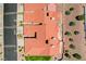 An overhead view showcasing the layout of homes with red tile roofs and desert landscaping at 445 Intrepid Ct, Boulder City, NV 89005