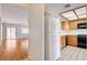 Bright kitchen featuring tile floors, wood cabinets, modern appliances, and lots of counter space at 445 Intrepid Ct, Boulder City, NV 89005