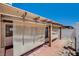 Covered patio area featuring a wooden pergola at 445 Intrepid Ct, Boulder City, NV 89005