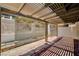 Shaded patio with brick pavers and wooden pergola at 445 Intrepid Ct, Boulder City, NV 89005
