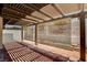Cozy patio area with wooden pergola and shade at 445 Intrepid Ct, Boulder City, NV 89005