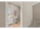 Bathroom featuring single vanity and wood flooring at 4620 E Suntree Ct, Pahrump, NV 89061