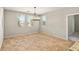 Dining area featuring natural light, neutral walls, and tile floors at 4620 E Suntree Ct, Pahrump, NV 89061