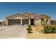 Lovely single-story home with a two-car garage, low maintenance landscaping, and charming curb appeal at 4620 E Suntree Ct, Pahrump, NV 89061