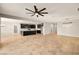 Large open living space with tile floors flows into the kitchen at 4620 E Suntree Ct, Pahrump, NV 89061