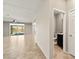 A spacious living room with tiled floors and access to a pool area at 4620 E Suntree Ct, Pahrump, NV 89061