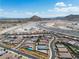 Aerial view of the community featuring mountain views and modern homes at 5264 Mystic Ivy Dr, Las Vegas, NV 89149