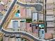 Aerial view of a neighborhood with a pool and well-maintained lawns at 5264 Mystic Ivy Dr, Las Vegas, NV 89149