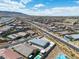 An aerial view of a desert home neighborhood, showcasing community and street layout at 5264 Mystic Ivy Dr, Las Vegas, NV 89149