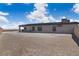 Backyard with gravel landscaping and concrete patio at 5264 Mystic Ivy Dr, Las Vegas, NV 89149