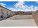 Backyard with gravel landscaping and concrete patio at 5264 Mystic Ivy Dr, Las Vegas, NV 89149