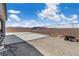 Spacious backyard with concrete patio and gravel area at 5264 Mystic Ivy Dr, Las Vegas, NV 89149