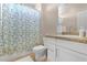 This bathroom features a vanity, toilet, shower and tub at 5264 Mystic Ivy Dr, Las Vegas, NV 89149