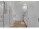 Bathroom featuring separate tub and shower, double sinks, and white cabinets at 5264 Mystic Ivy Dr, Las Vegas, NV 89149
