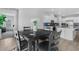 Cozy dining area adjacent to the kitchen, with natural light and room for four at 5264 Mystic Ivy Dr, Las Vegas, NV 89149