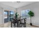 Cozy dining area with sliding glass doors to the backyard at 5264 Mystic Ivy Dr, Las Vegas, NV 89149