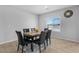 This dining room features a table and six chairs at 5264 Mystic Ivy Dr, Las Vegas, NV 89149