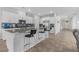 The kitchen has a granite top island with bar stool seating at 5264 Mystic Ivy Dr, Las Vegas, NV 89149