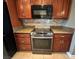 Stainless steel oven and microwave with matching granite counters and cabinets at 5439 E Cansano St, Pahrump, NV 89061