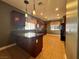Spacious kitchen featuring granite countertops, dark wood cabinets, and stainless steel appliances at 5439 E Cansano St, Pahrump, NV 89061