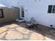 A cozy backyard with patio and furniture at 565 Greenbriar Townhouse Way, Las Vegas, NV 89121
