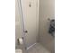 Bathroom with towel rack and tile flooring at 565 Greenbriar Townhouse Way, Las Vegas, NV 89121